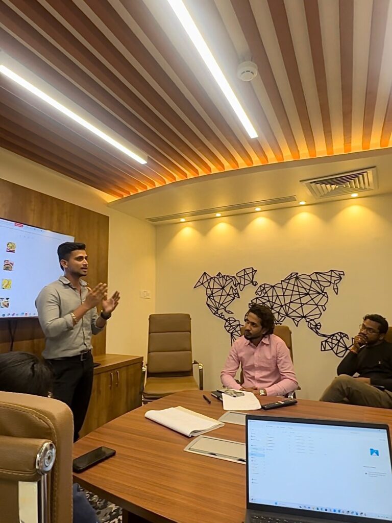 "Digital marketing agency team collaborating on project strategy in modern office"